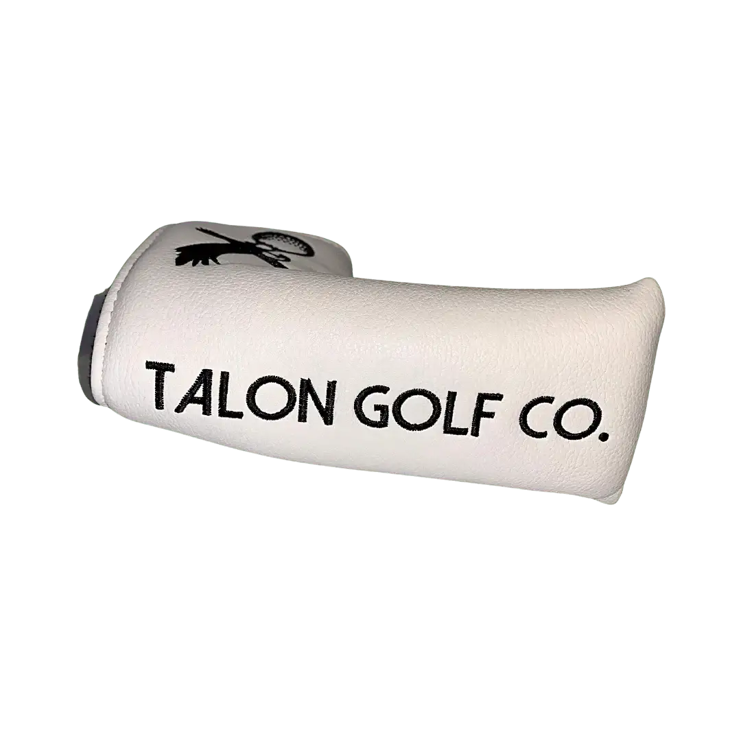White leather putter cover with black Talon Golf Co. logo and eagle design