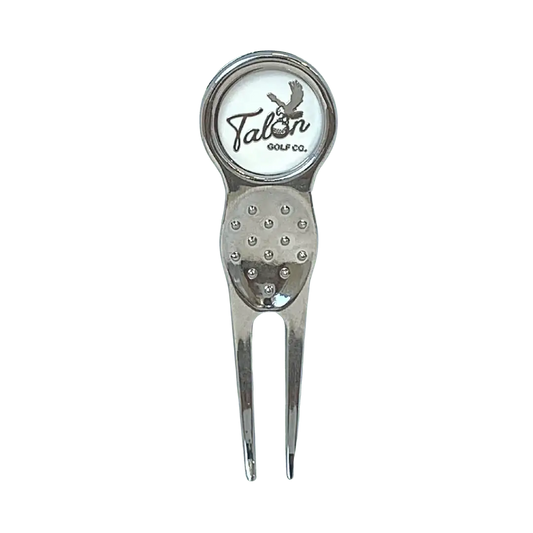 silver golf divot tool with magnetic ball marker featuring Talon Golf Co. logo and eagle design