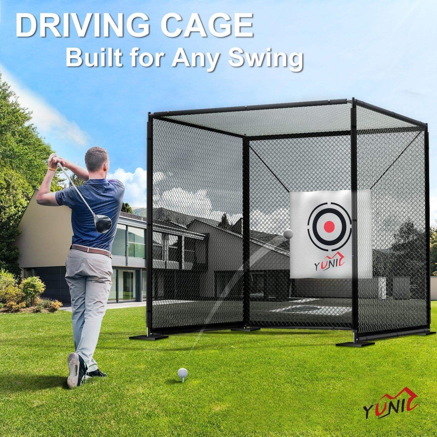 Man practicing golf swing in a black driving cage with target net on a green lawn