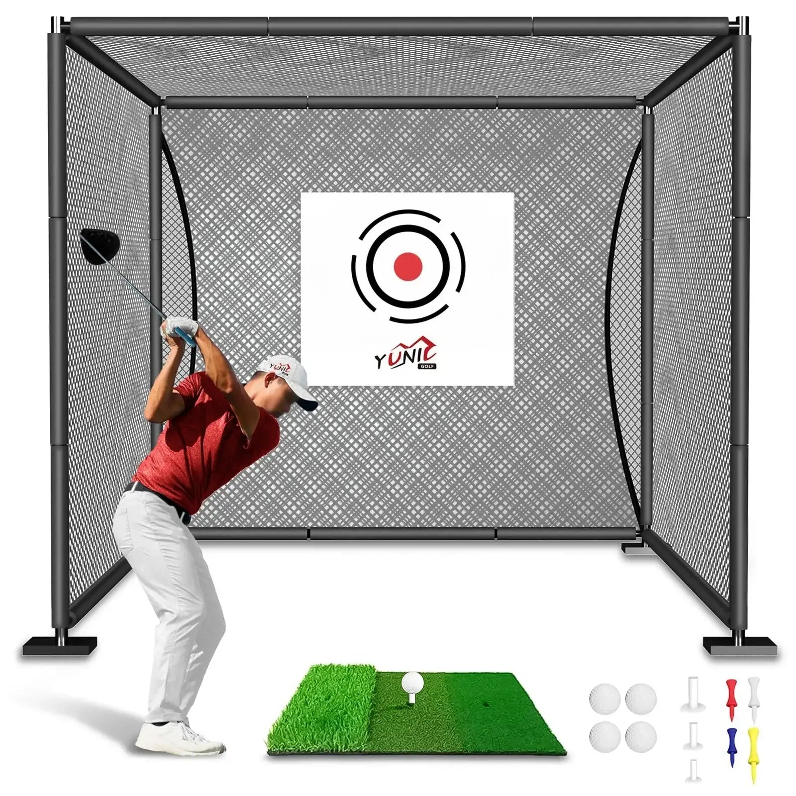 Man swinging golf club in black golf practice cage with green mat, golf balls, and tees