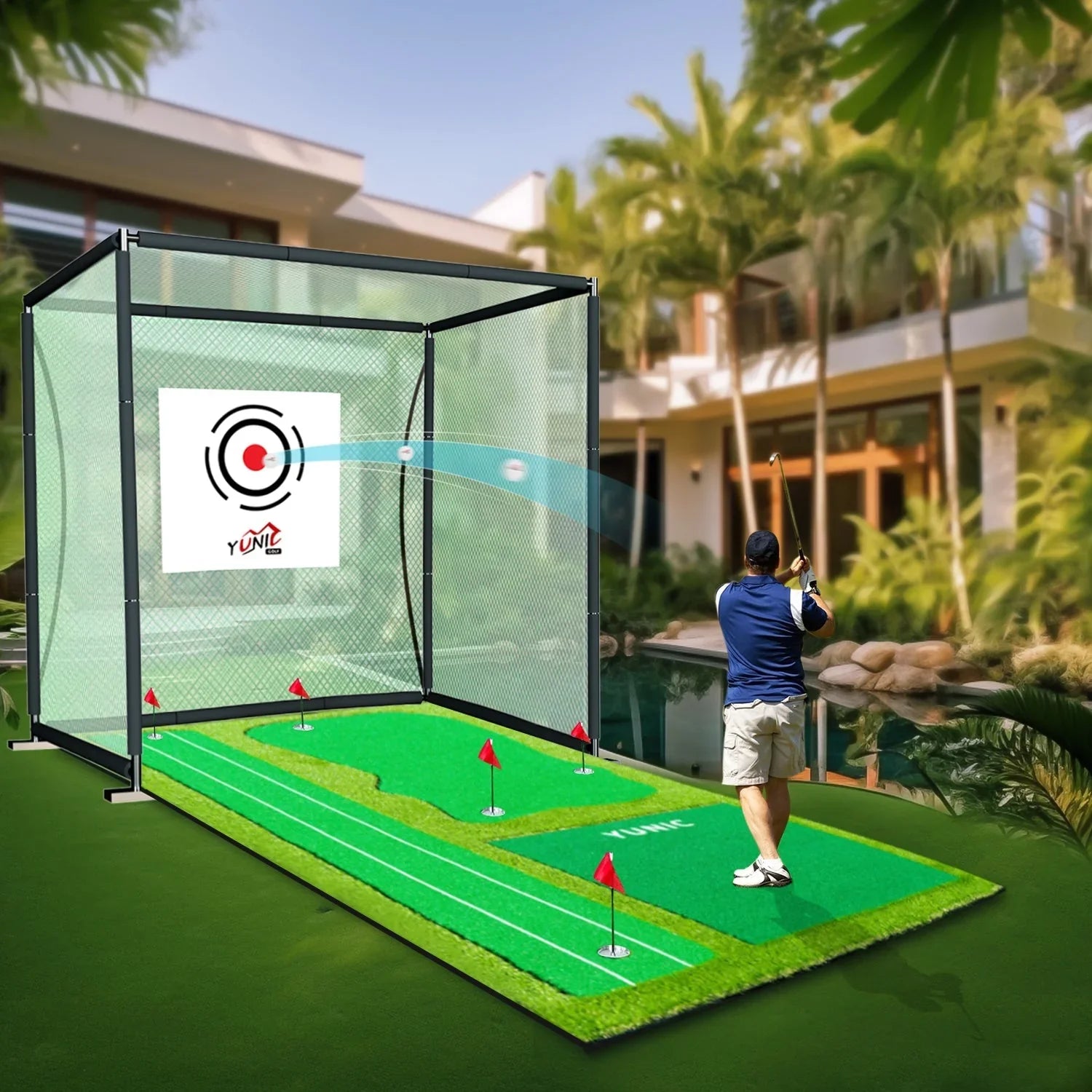 Man playing golf on outdoor putting green mat with net target in backyard