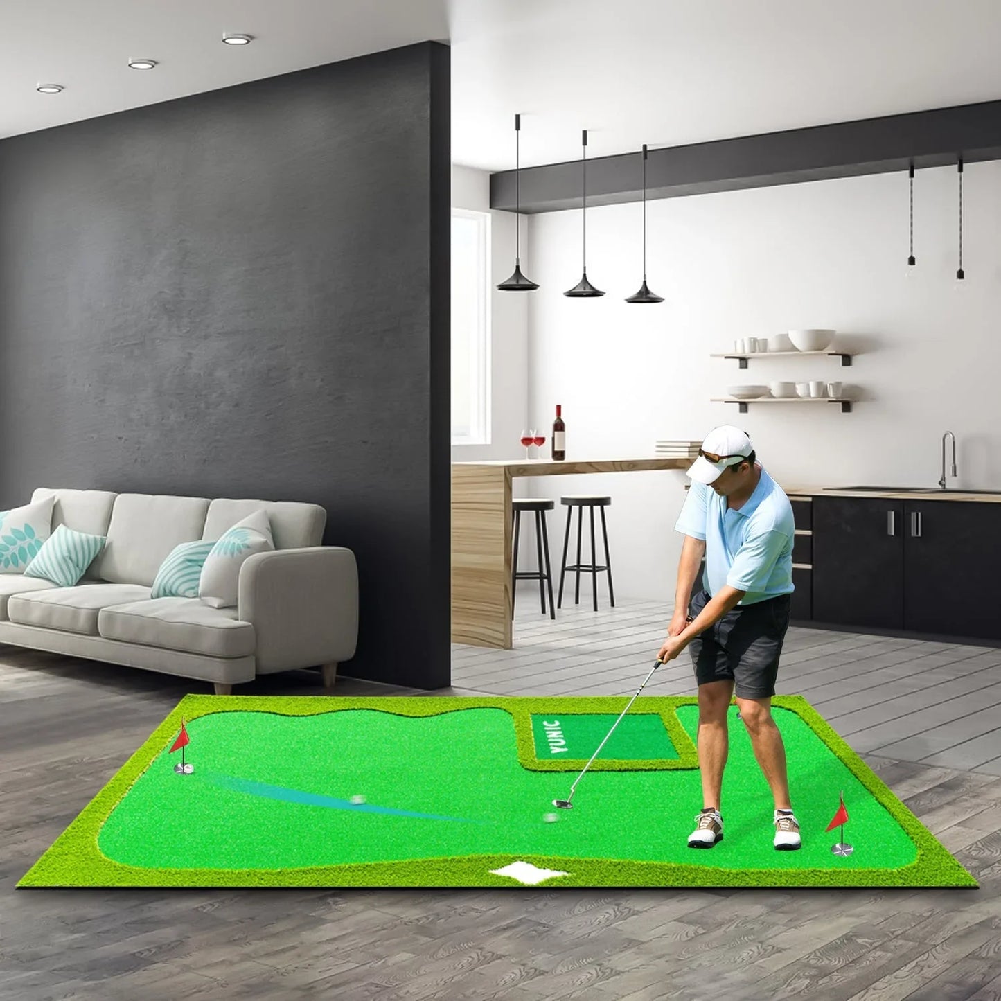 Man practicing golf putting indoors on bright green putting mat in modern living room kitchen