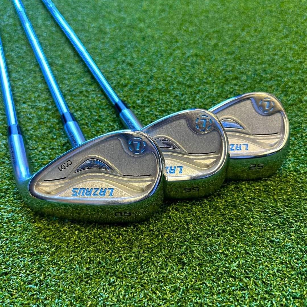 Three Lazrus forged golf wedges with cavity back design on green grass