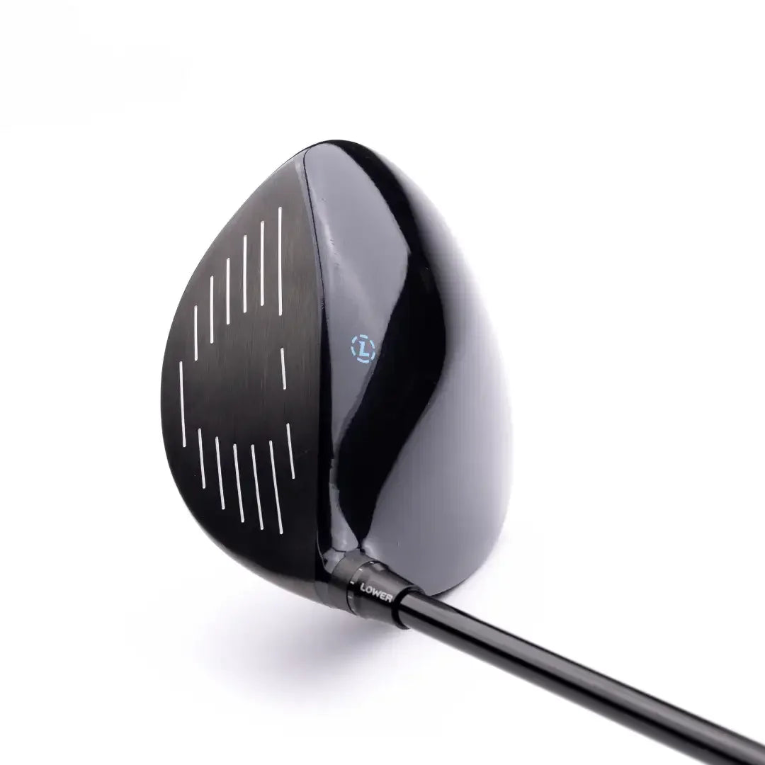 Black adjustable golf driver head with white alignment lines on a white background