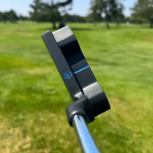 Lazrus Golf black milled face putter with blue alignment line on sunny golf course
