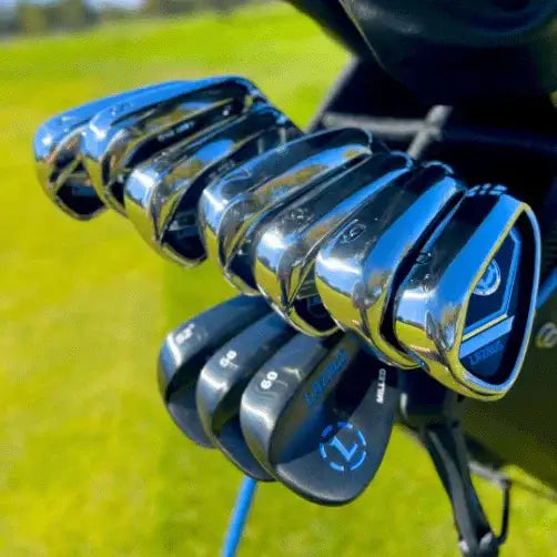 Set of Lazrus golf irons and wedges in a golf bag on a sunny course