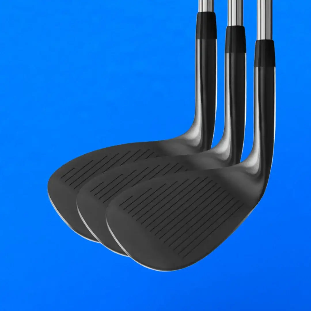 Set of three black forged golf wedges with chrome shafts against a blue background