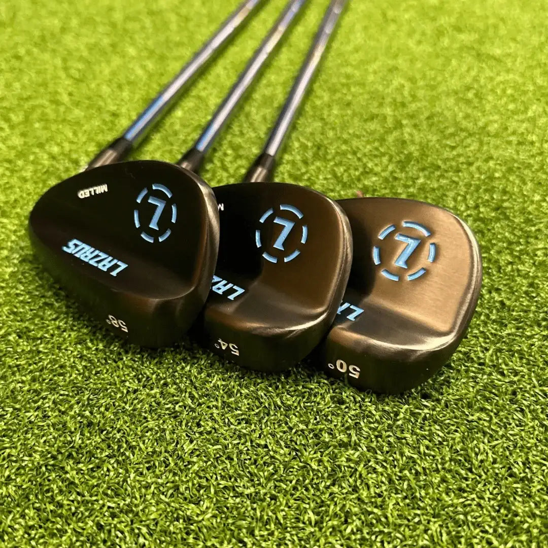 Set of three Lazrus forged golf wedges with lofts 50, 54, 58 degrees displayed on green turf