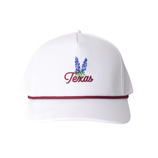White baseball cap with maroon trim and embroidery of bluebonnet flowers and Texas text