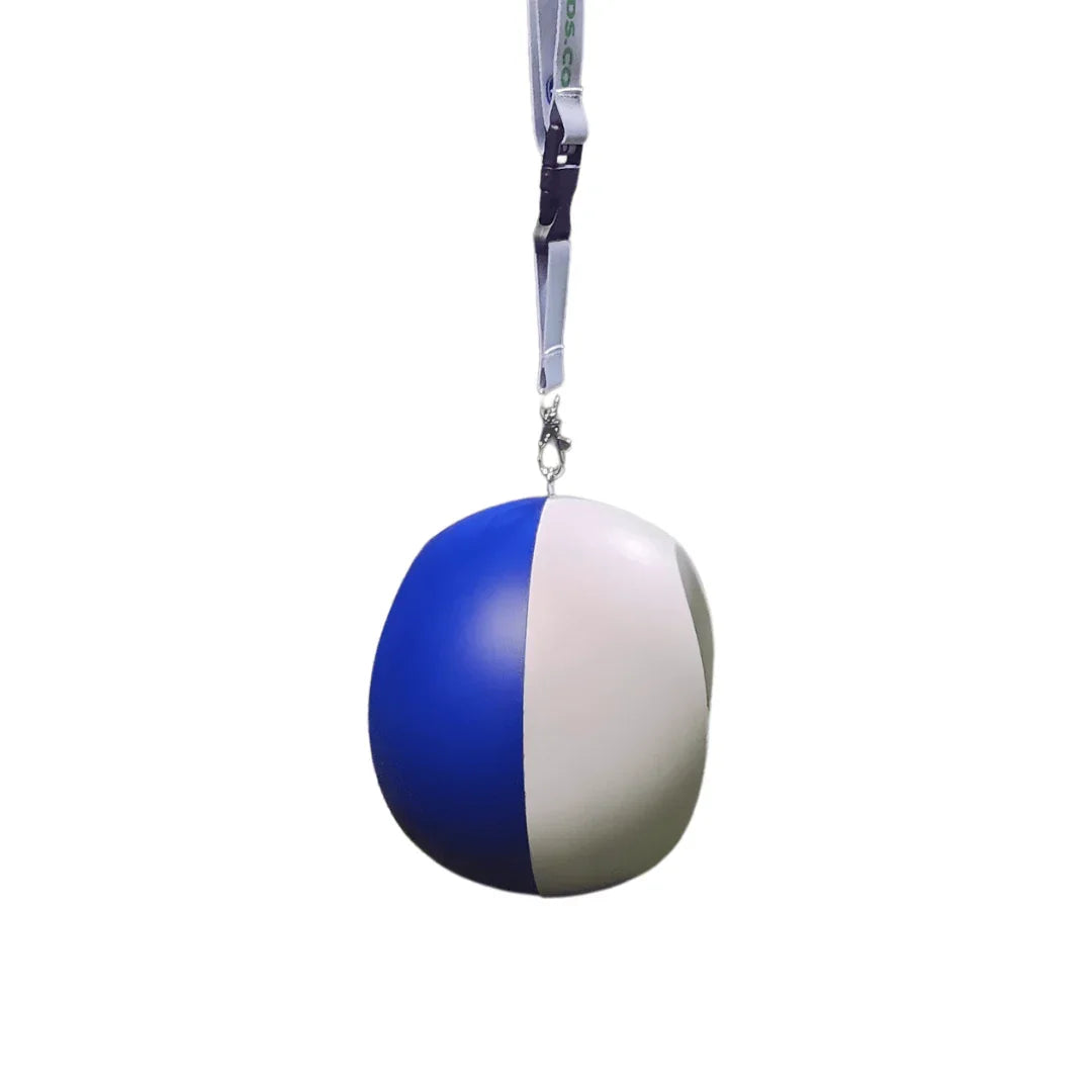 Blue and white compression ball golf swing training aid suspended by a white strap