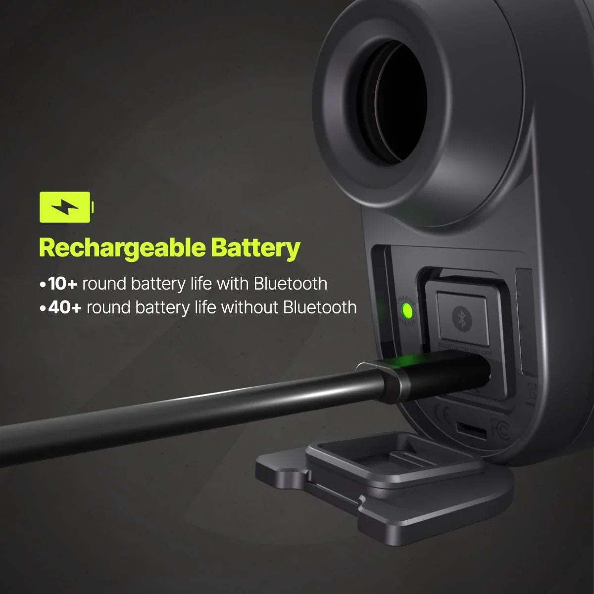 Close-up of Titan Elite rangefinder charging with USB cable and battery life details in dark background