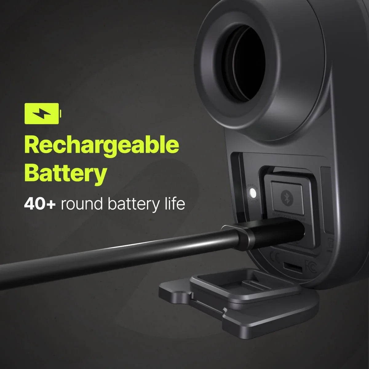Close-up of a device's rechargeable battery port with a charging cable inserted, highlighting 40+ round battery life