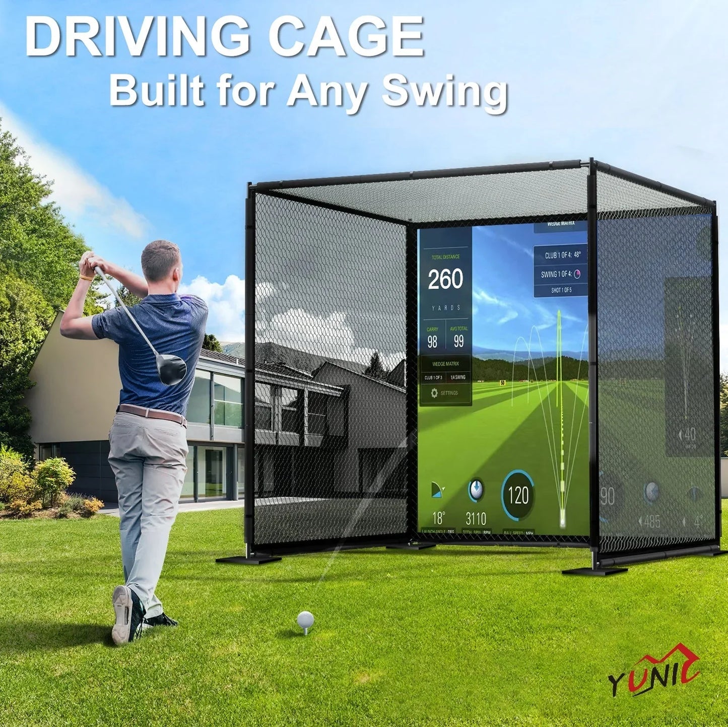 Man swinging golf club in yard hitting ball into Yunic metal driving cage with golf simulator screen